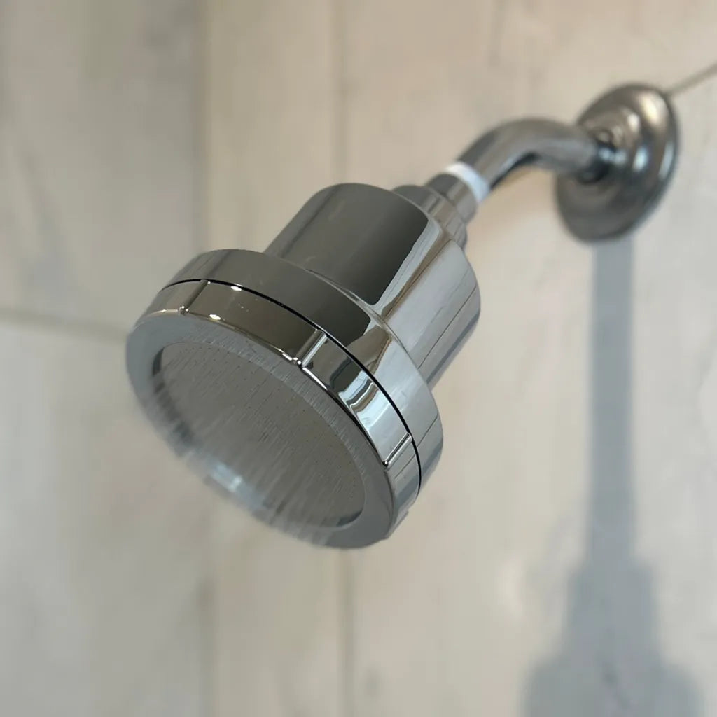 Close-up of clean, filtered water flowing from the eskiin showerhead